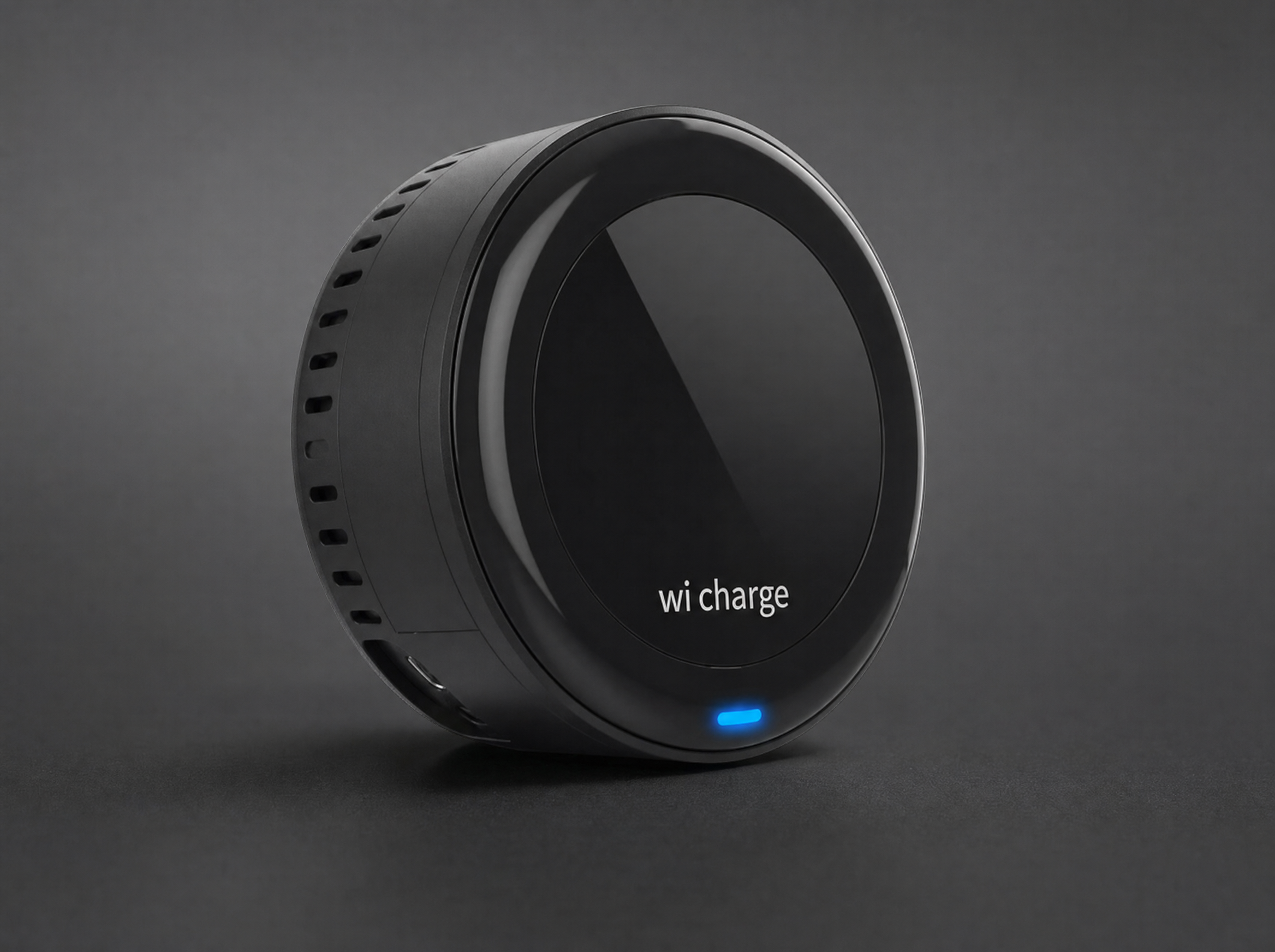 Detail photo of the Wi-Charge receiver module mounted on a Kontrol lock — close-up macro on the antenna array. Clean studio light, dark backdrop, Israeli technology emphasis.